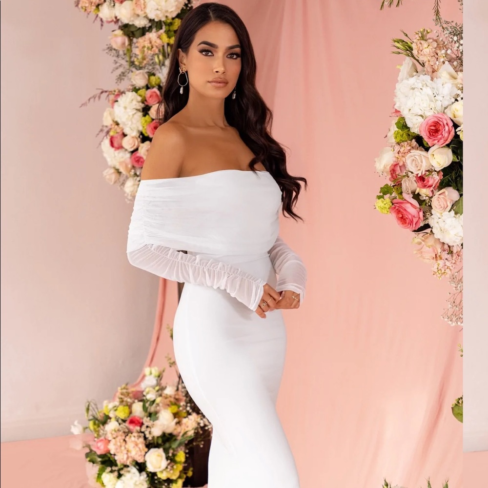 White jumper with feathers & white dress